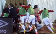 Albania players flee tunnel